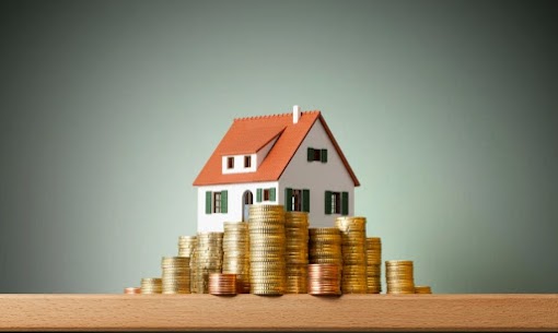 House on stacked coins symbolizing Texas cash-out refinance and home equity growth.