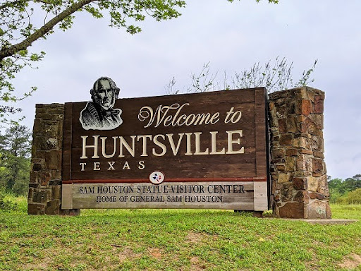 Welcome sign to Sam Houston Statue Visitor Center in Huntsville, Texas