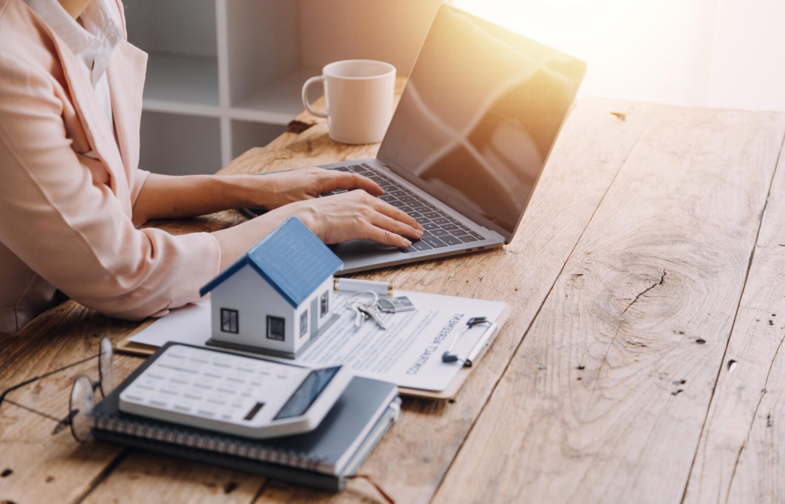 Denton Texas first time home buyer sitting at desk completing mortgage application