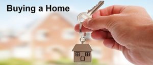 Hand holding house keychain symbolizing the homebuying process in Texas