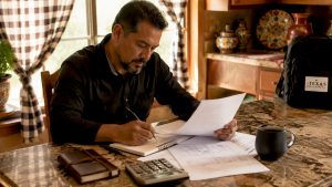 Homebuyer reviewing Texas construction loan documents